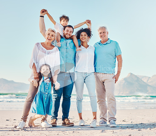 Image of Parents, grandparents and a children at the beach for a family vacation, holiday or adventure. Portrait of multiracial men, women and young kids together outdoor for summer fun, bonding and travel