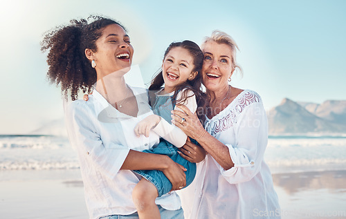 Image of Mother, grandmother and a child happy at the beach on a family vacation, holiday or adventure. Senior woman, mom and girl kid laugh together outdoor for summer fun, freedom and travel or quality time