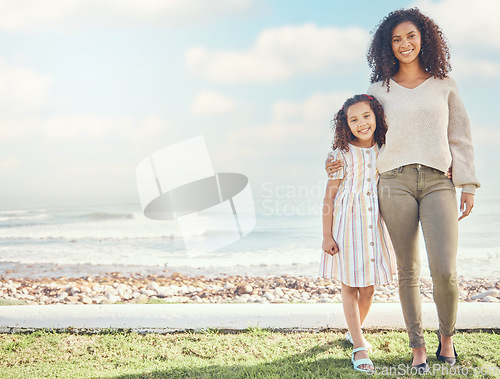 Image of Portrait, happy mother and girl at beach on holiday, vacation or summer travel for bonding together. Sea, kid and African mom with child, love and care with a smile for family time outdoor by ocean