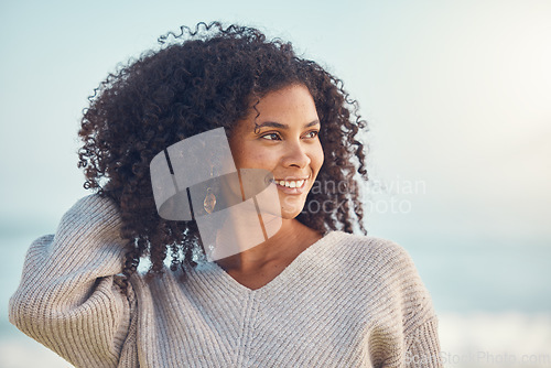 Image of African woman, thinking and happiness at the beach, ocean or idea for holiday, vacation or summer at the sea in Puerto Rico. Travel, freedom and smile on face for nature, adventure and blue sky