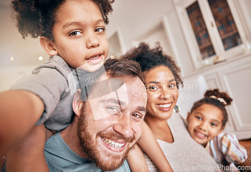 Image of Selfie, smile and piggyback with a blended family in their home together for love, fun or bonding closeup. Portrait, happy or support with parents and kids posing for a playful photograph in a house