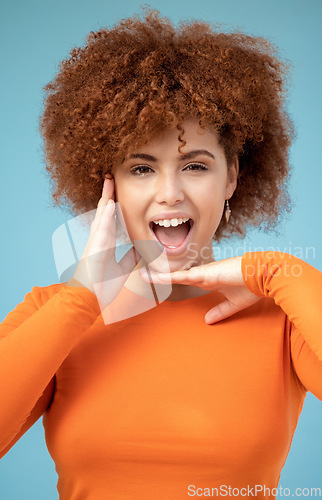 Image of Confident, happy and portrait of a woman with hands for frame isolated on a blue background. Smile, crazy and face of an African girl with a wow facial expression, excited and funny on a backdrop