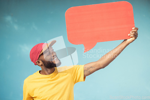 Image of Advertising, speech bubble and black man on blue background for announcement, news and information. Creative marketing, branding mockup and male smile with copy space on poster, billboard and sign