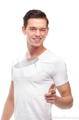 Image of Casually handsome. A cropped portrait of a confident young man pointing, isolated on white.