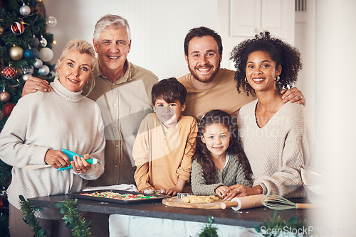 Image of Christmas, portrait and family cooking cookies in home kitchen, bond and together. Xmas, baking food and happy face of grandparents, children and interracial parents at party, celebration or holiday