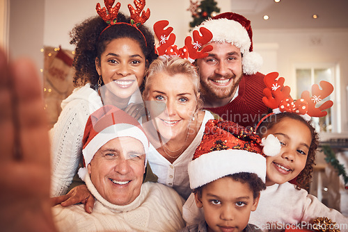 Image of Christmas, portrait and selfie of big family in home, bonding and together. Xmas, smile and face of parents, children and grandparents, interracial or profile picture at party, celebration or holiday