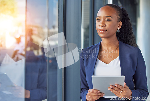 Image of Office, happy woman with tablet and thinking at window in business, smile and insight for online career. Happiness, digital work and businesswoman with ideas, planning and feedback for internet job.