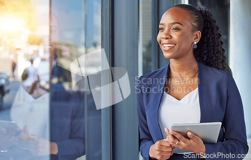 Image of Business, black woman with smile and tablet at window in office, thinking and ideas for online career. Happiness, digital work and businesswoman with insight for planning feedback for internet job.