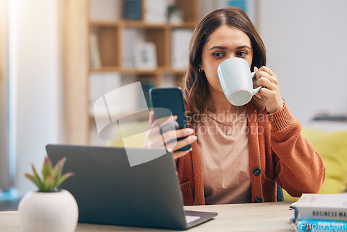 Image of Remote work from home, coffee and woman with smartphone, message and research for a project. Female person, freelancer or entrepreneur with a tea, espresso and cellphone with network and social media