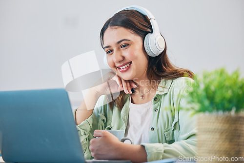 Image of Laptop, education and headphones with woman in home office for elearning, study and blog. Digital, online class and college with female student and research for streaming, virtual and subscription