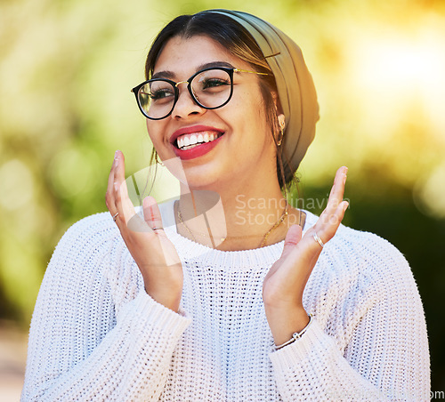 Image of Young woman, smile and happy face outdoor in nature with glasses and freedom in summer. Fashion, style and gen z female model or student with a turban scarf, happiness and positive mindset at park
