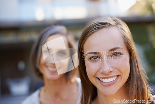 Image of She learned from the best. Portrait of a happy young woman and her mother.