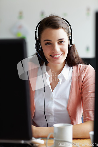 Image of Call center, happy woman and portrait in office communication, virtual support and computer software. Face of young agent, web advisor or person with customer services helping or telemarketing job