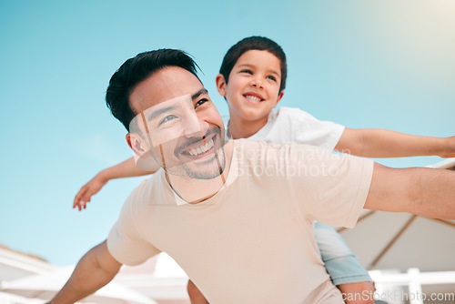 Image of Happy, relax and piggyback with father and son in backyard for playful, support and airplane. Happiness, smile and love with man and child at family home for care, excited and games together