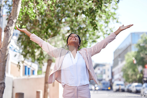 Image of Freedom, city and businesswoman stretching arms in achievement of success, happiness and motivation. Urban business, power and happy woman in street in winning celebration of promotion, bonus or deal