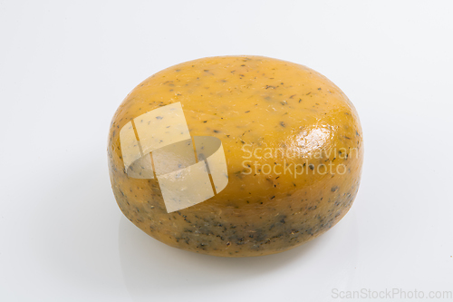 Image of A piece of fresh processed cheese isolated on a white background