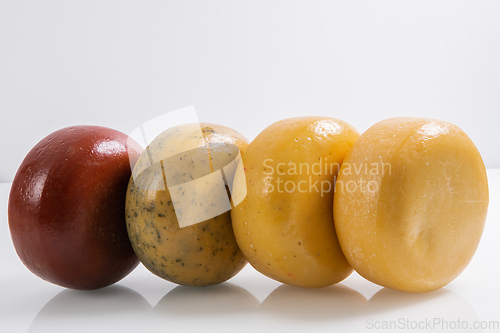 Image of Different types of homemade traditional Bosnian cheese isolated on a white background