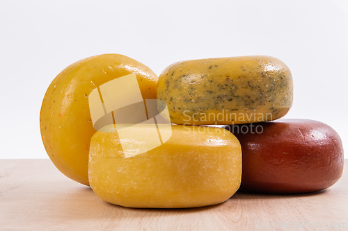 Image of Different types of homemade traditional Bosnian cheese isolated on a white background