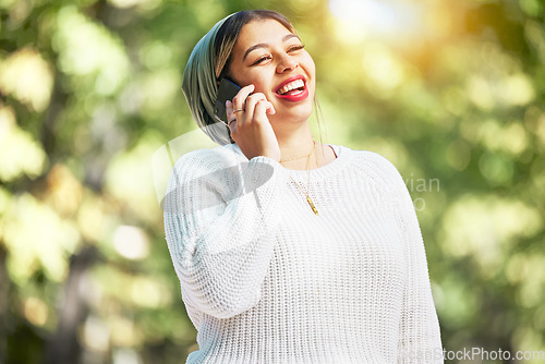 Image of Woman, phone call and talk with laugh in park, communication and funny chat in summer sunshine. Muslim student girl, smartphone and comic conversation with listening, contact and thinking outdoor