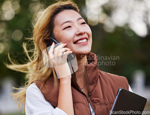 Image of Happy, talking and a woman on a phone call while thinking in the city for business or networking. Smile, idea and an Asian employee with communication on a mobile for conversation, chat or planning
