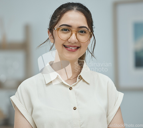 Image of Latino woman, portrait and smile in office with glasses, ambition and clothes for career in finance agency. Young accounting employee, happy and confident for future, opportunity and start at new job