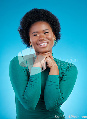 Image of Smile, portrait and fashion with black woman and hands in studio background with positive mindset. Happy, face and confidence with african person or motivation or proud expression in blue background.