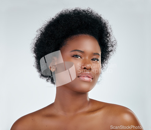 Image of Portrait, natural hair and black woman with glow in skincare or cosmetic on white background in studio. Beauty, face and dermatology for african girl with shine for treatment or self love in mock up.