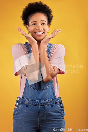 Image of Thinking, choice and woman with a smile, decision and problem solving on a yellow studio background. Female person, opportunity or happy model with happiness, solution and ideas with wonder and emoji