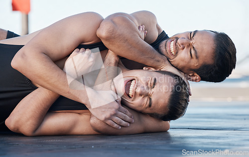 Image of Men fight, mma and choke hold outdoor for competition, exercise and workout. Wrestling, grappling and people in battle, challenge and combat for martial arts, fitness sports and training with pain