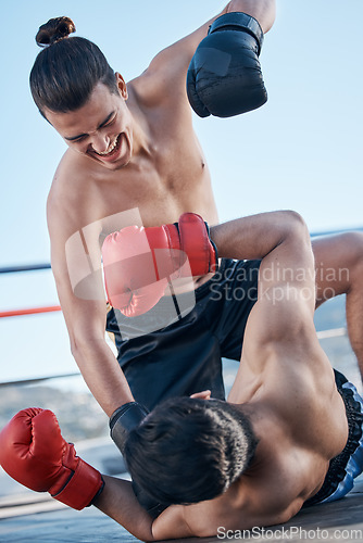 Image of Floor, boxing ring or angry man fighting in sports exercise, workout or match competition in city outside. Ground punch, boxers or fighters fighting in fitness workout or mma battle for self defense