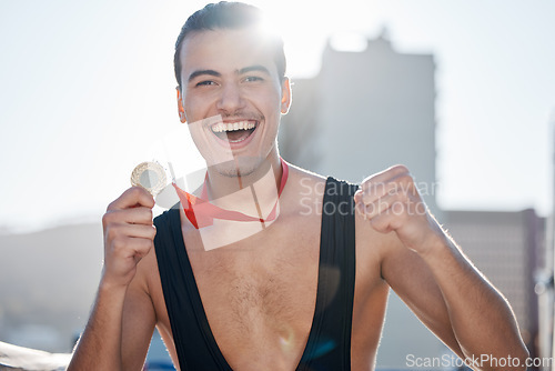 Image of Success, wrestler or portrait of happy man with medal to celebrate winning a wrestling competition with pride. Winner, fitness or excited champion athlete with fighting victory award, gold or prize