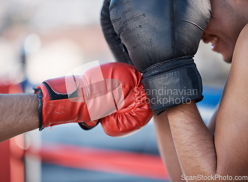 Image of Punch, boxing gloves or men fighting in sports training, exercise or fist punching with power. Block, boxers hands or combat fighters boxing in practice or fitness workout in ring for self defense