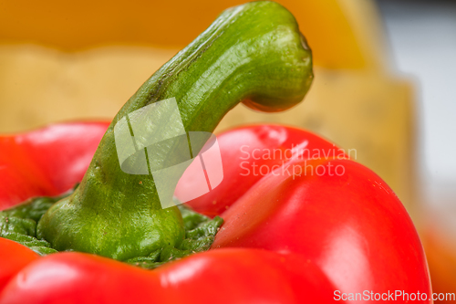 Image of Bosnian traditional cheese served on a wooden container with peppers, parade and onions isolated on a white background