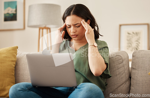 Image of Woman, home and headache with laptop learning and remote work stress on a sofa feeling frustrated. House, female person and confused from computer problem with anxiety from online website project