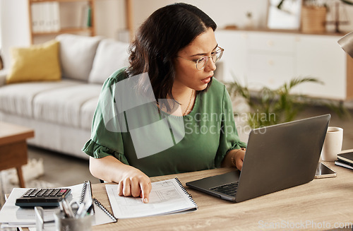 Image of Finance, documents and woman with laptop in home office for debt budget, taxes and remote work. Freelance, accounting and female online for savings, review or analysis, development or business growth