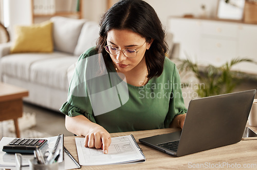 Image of Documents, finance and woman with laptop in home office for debt budget, taxes and remote work. Freelance, accounting and female online for savings, review or analysis, development or business growth