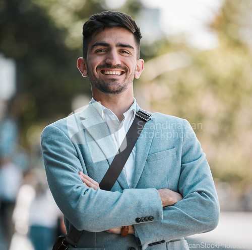 Image of Crossed arms, city and portrait of business man for happy mindset, startup goals and commute. Travel, professional job and face of male entrepreneur in urban town for career, working and success