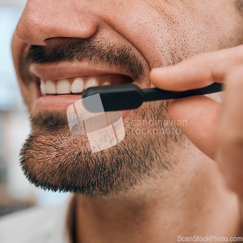 Image of Call center, man or mouth of consultant for customer service, tech support or CRM communication. Closeup face of salesman, agent or smile for telemarketing advisory, telecom contact or FAQ questions