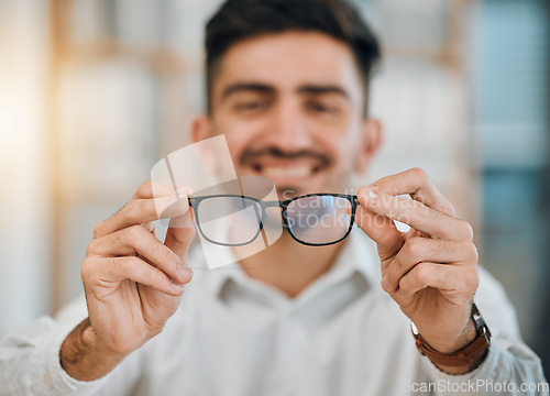 Image of Hands, man and optometrist with glasses for vision, eyesight and prescription eye care. Closeup of doctor, optician and frame of lens for eyewear, test or consulting for optical healthcare assessment