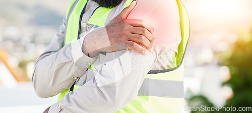 Image of Man, architect and hands with shoulder pain in city from injury, accident or muscle tension on rooftop. Closeup of male person with sore arm, ache or joint inflammation during construction on site