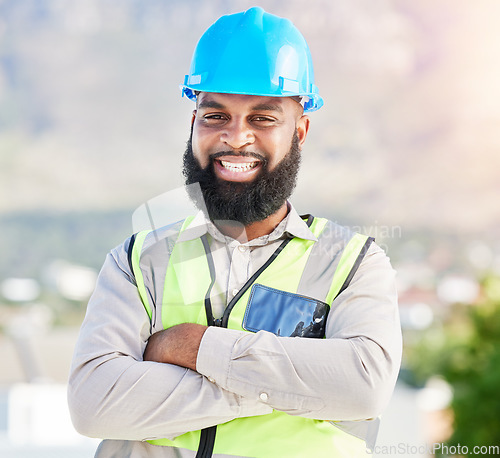 Image of Happy black man, portrait and architect with arms crossed in city for construction management on site. Face of African male person, engineer or contractor smile for industrial architecture on rooftop