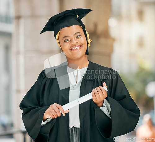 Image of Success, university and portrait of woman at graduation with degree, diploma or certificate scroll. Achievement, education and young African female college graduate with crossed arms for confidence.