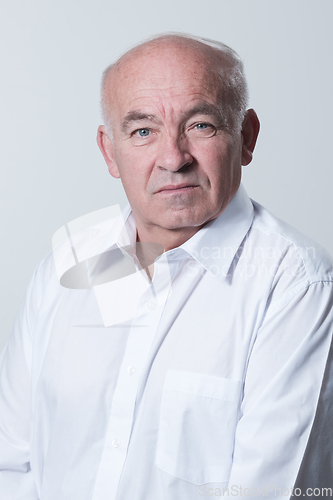 Image of Senior grey-haired man wearing elegant shirt isolated on white background depressed and worry for distress, crying angry and afraid. Sad expression.