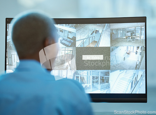 Image of Security guard, safety and person in control room with computer screen for surveillance. Behind a worker at a cctv monitor for crime investigation, dashboard and camera footage at private property