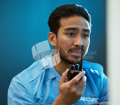 Image of Man, walkie talkie and a security guard or safety officer in office with communication. Face of an alert and worried person with a radio to report crime for investigation, backup or surveillance