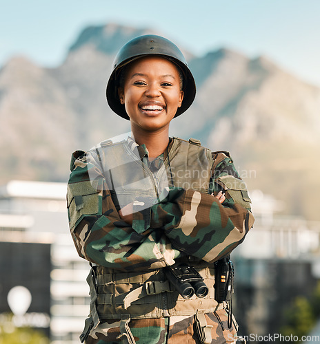 Image of Military, portrait and happy black woman with arms crossed in city for power, confident or smile outdoor. War, security and face of lady warrior proud, hero and ready for army, protection or training