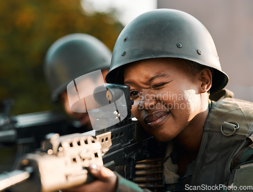 Image of Army, people and gun for training, defense or power on rooftop for aim, shooting or practice. Military, weapon and black woman with man soldier and sniper rifle for war, target or protection team