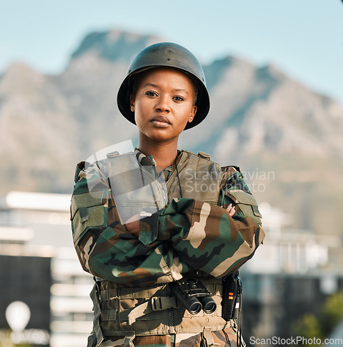 Image of Soldier, portrait and black woman with arms crossed in city for power, confidence and mindset outdoors. War, combat and face of female warrior proud, hero and ready for army, protection or training