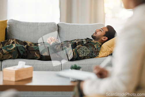 Image of Veteran, therapy and talk to psychologist on couch and mental health support for military, consultation or listen to trauma or war story. Sad, memory or speaking with therapist for healing or help