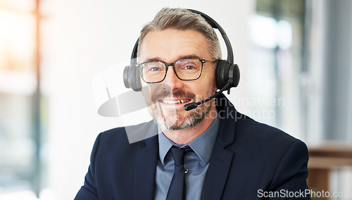 Image of Call center, portrait and senior man with CRM and contact us, headset for communication and professional headshot. Telecom, customer service and male consultant with help desk employee and mic